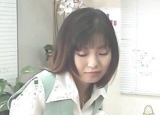 Fit Asian wearing bunny ears as she puts on a show