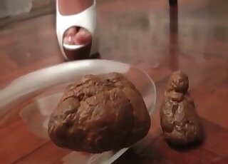 Lovely model with natural boobs is shitting on the plate