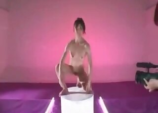 Muscular Asian brunette flexing and looking hot